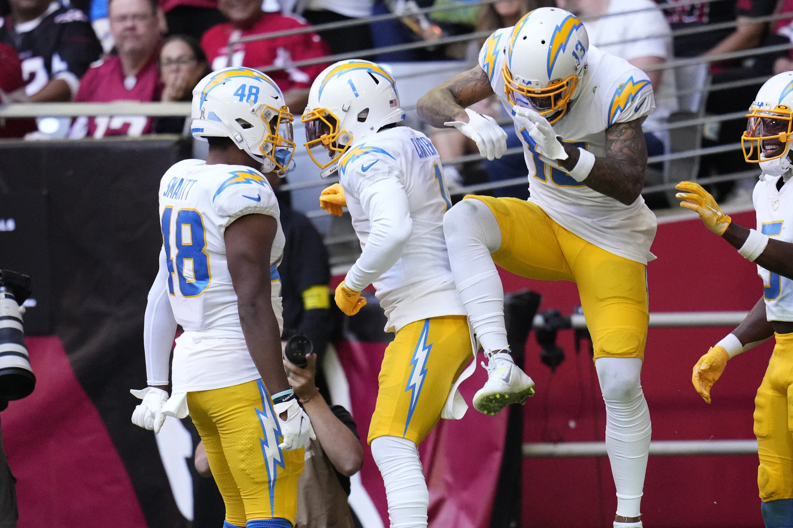 Los Angeles Chargers wide receiver DeAndre Carter (1) is stopped